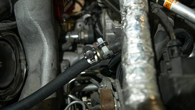Install the coolant re-route kit