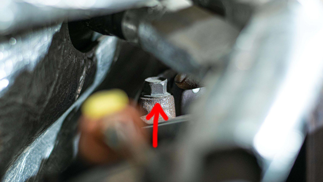 Remove the up-pipe to EGR cooler bolts