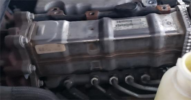 Unbolt the EGR cooler straps from the intake manifold