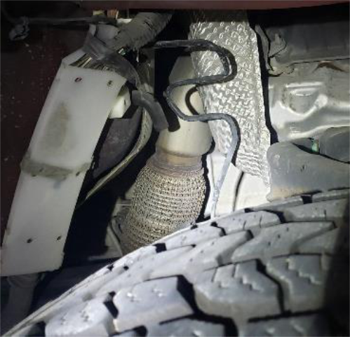 Remove the heat shield on the downpipe
