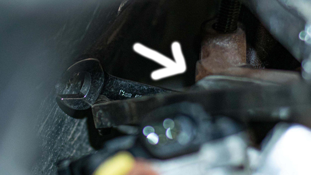 Remove the up-pipe to EGR cooler bolts
