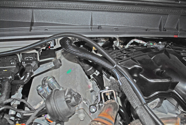 Disconnect the quick-connect coolant line from the metal standpipe