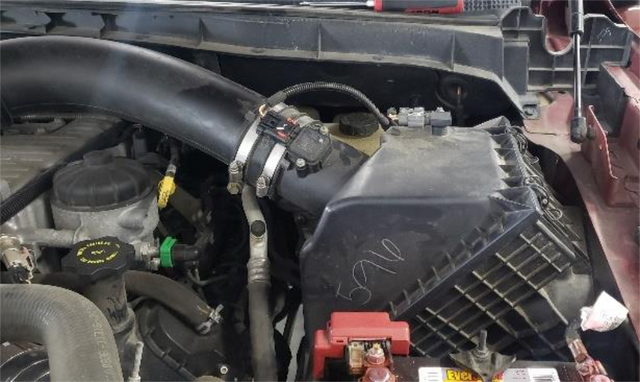 Unplug the MAF connector on the intake hose