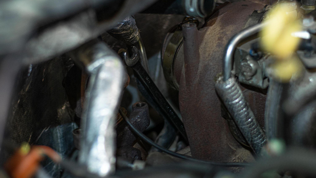 Remove the up-pipe bolts at the turbo