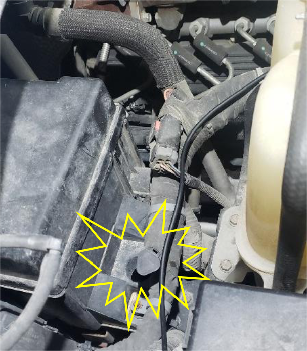 Connect the grey triangle connector behind the radiator overflow
