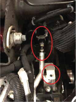 Remove the passenger side coolant hardline