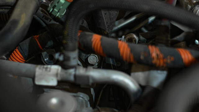 Unbolt the dipstick bracket