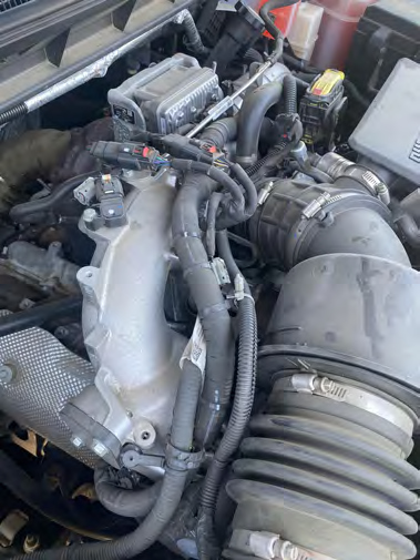 Disconnect the intercooler pipe from the Y-bridge and cover it