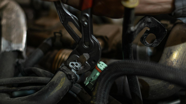 Unhook the coolant lines to the EGR cooler