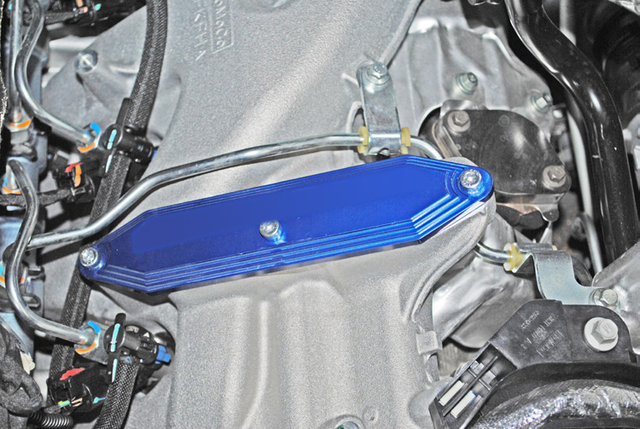 Install the exhaust manifold block off plate