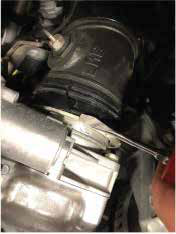 Disconnect the intercooler pipe from the Y-bridge and cover it
