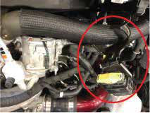 Remove the bale connector bracket on top of the A/C compressor