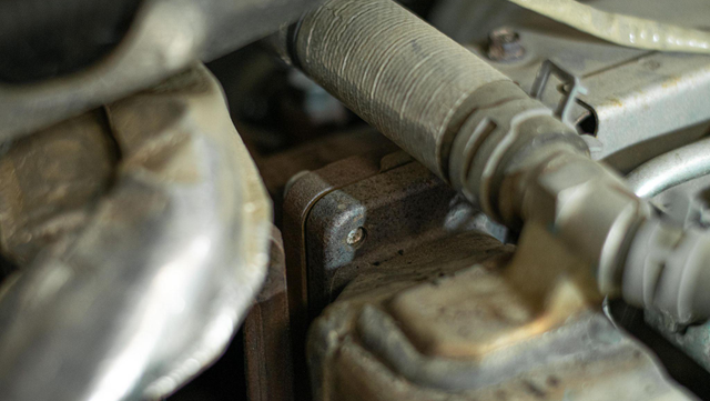 Unbolt the EGR cooler from the motor