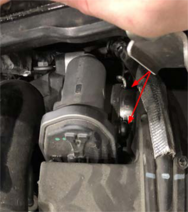 Unbolt the EGR pipe and throttle body from the intake elbow