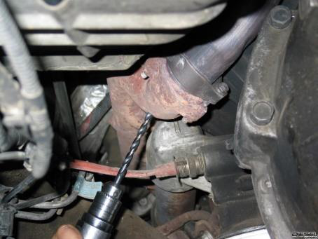Locate the spot on the exhaust manifold