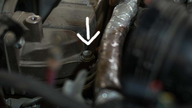 Unbolt the EGR cooler from the motor