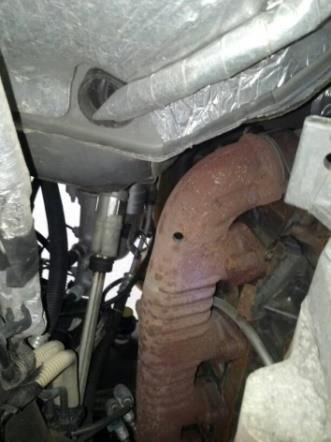 Locate the spot on the exhaust manifold
