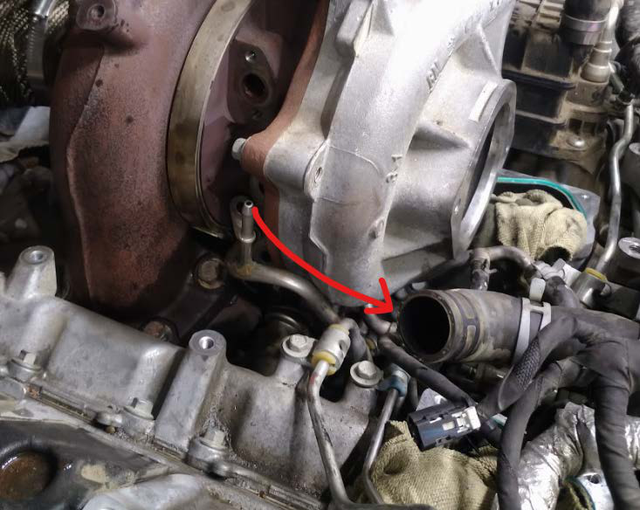 Remove the passenger side coolant hardline