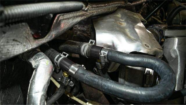 Install the coolant re-route kit