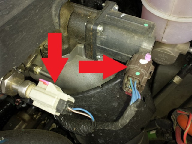 Unplug the two connectors in front of the brake fluid reservoir