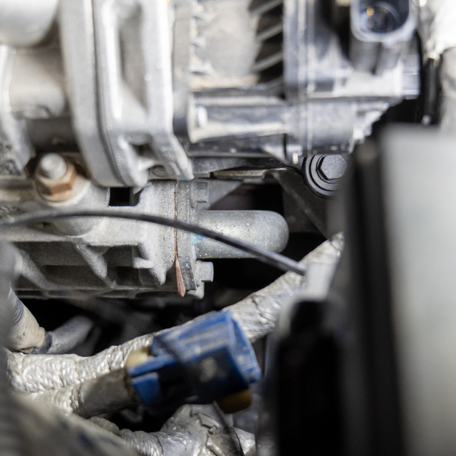 Remove both coolant lines from the EGR and free the feed pipe