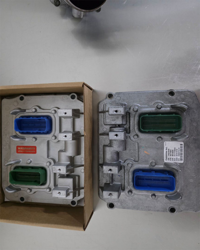 Disconnect the ECM connectors and unbolt the ECM