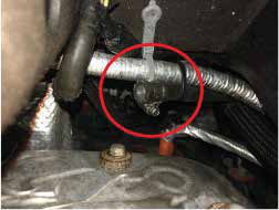Plug the lower radiator hose branch with the 5/16" barbed plug