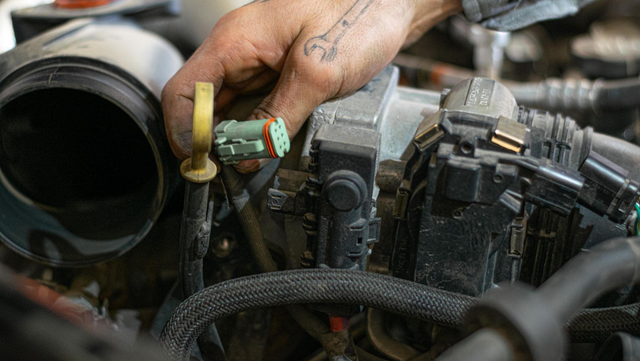 Disconnect the connectors on top of the motor