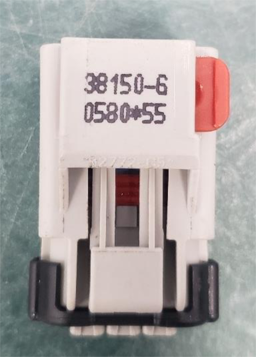 Plug the switch into the engine harness and blank the empty connector