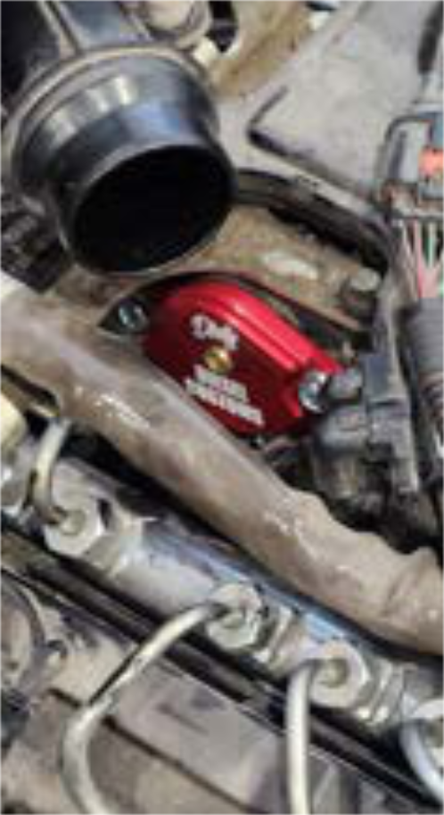 Remove the EGR intake tube and install the red blocker plate