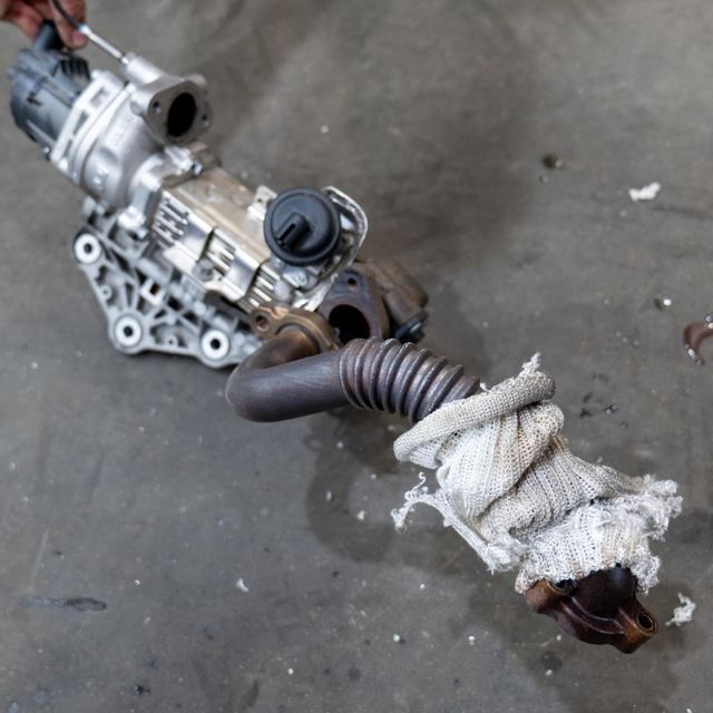 Tie up loose connectors, refill the coolant and refit the exhaust