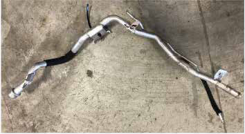 Remove the passenger side coolant hardline