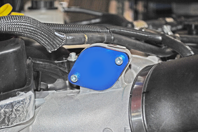 Install the intake manifold block off plate