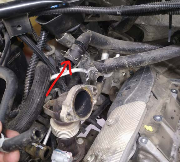 Quick-connect the upper end to the heater core fitting