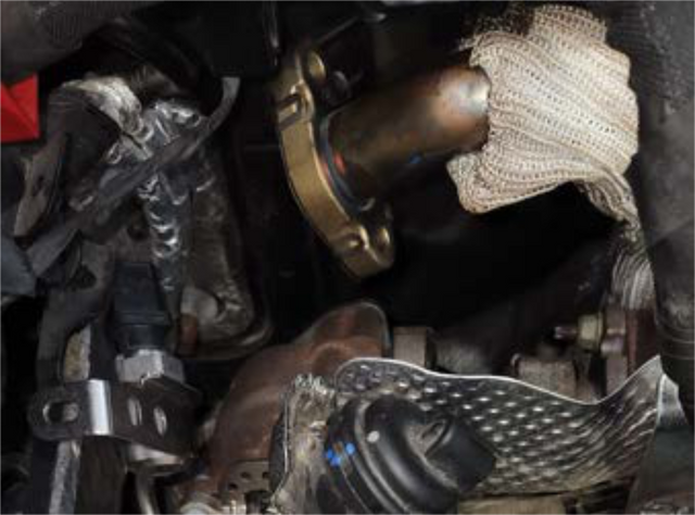 Undo the EGR exhaust tube at the cooler end