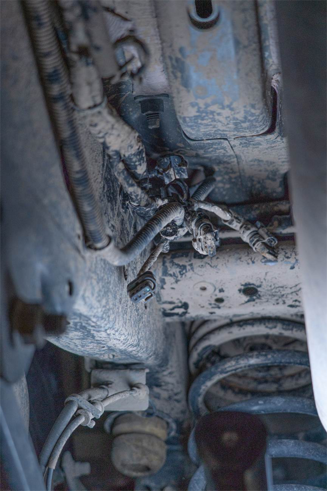 Disconnect and tuck away the rear connector cluster