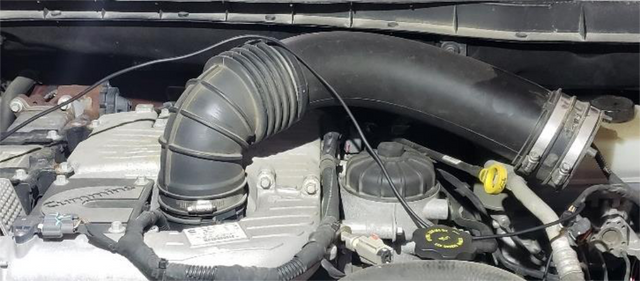 Remove the factory air duct clamp