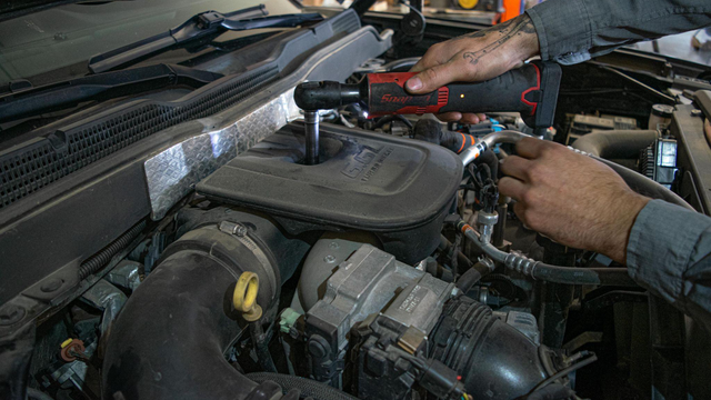 Remove the top cover and intake hose