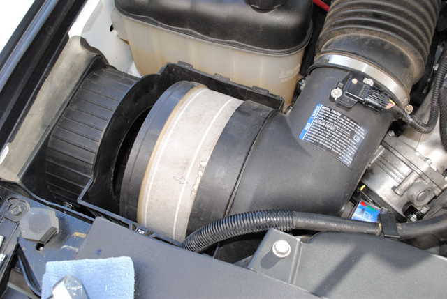 Refit the air box, filter and intake tube