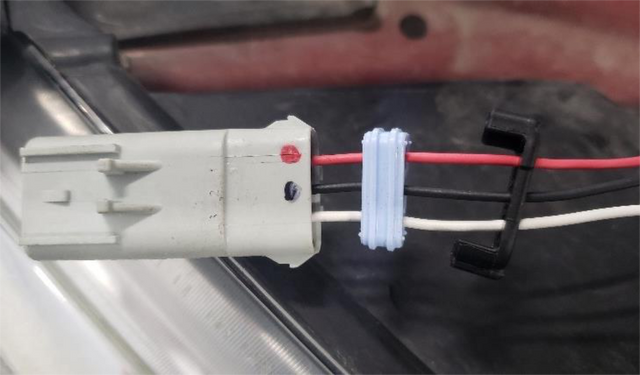 Pin the switch wires into the grey plug