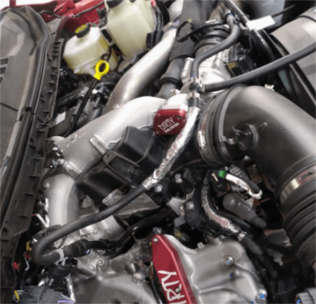Connect the coolant hose from the quick-connect to the coolant tee