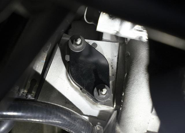 Install the black turbo block off plate