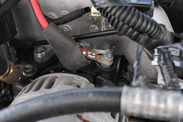 Reconnect the charge-back wire on the alternator