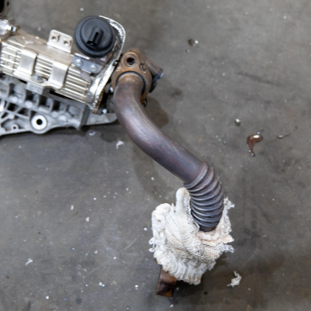 Tie up loose connectors, refill the coolant and refit the exhaust