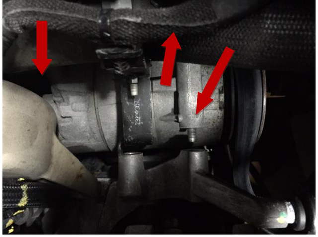 Unbolt the A/C compressor
