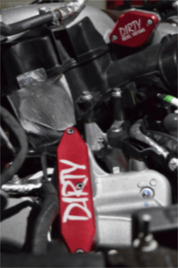 Install the exhaust manifold block off plate