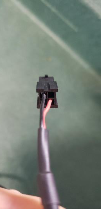 Fish the unlock cable through the hood latch grommet