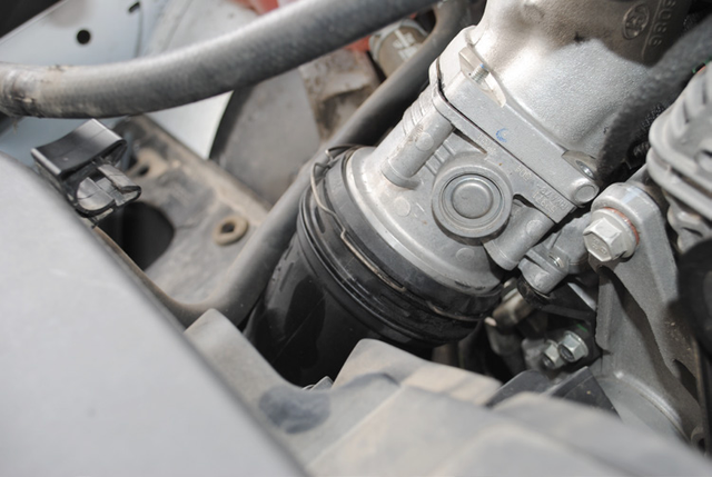 Disconnect the plastic intercooler pipe from the cast intake