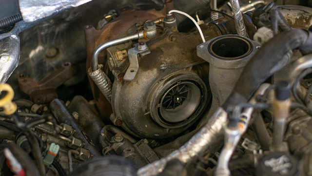 Remove the up-pipe bolts at the turbo