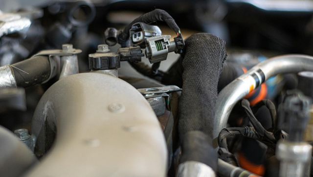 Disconnect the connectors on top of the motor